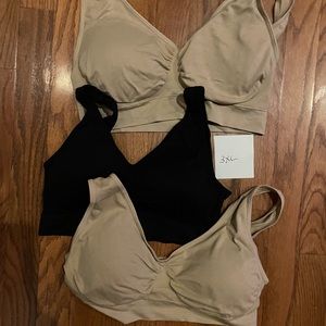 Set of three sports bras, no brand.